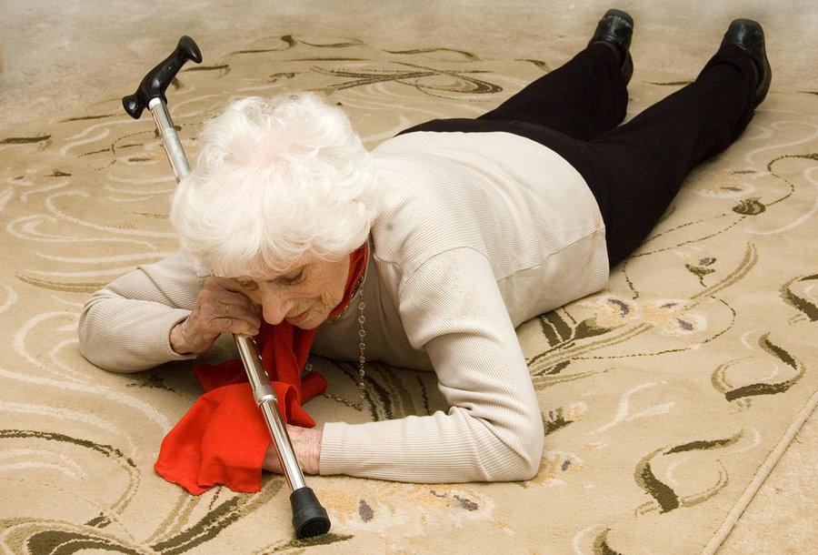 older lady lying on floor in a safe house