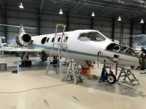 aircraft in hangar being inspected for asbestos